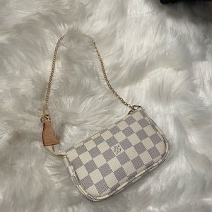 Louis Vuitton mini white plaid pochette bag